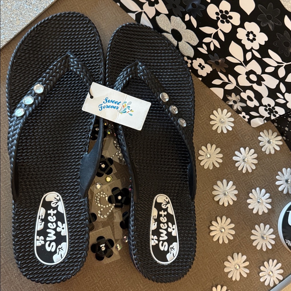 NWT Super Cute flip flops with flowers and rhinestones. Brand is Sweet Forever!💕